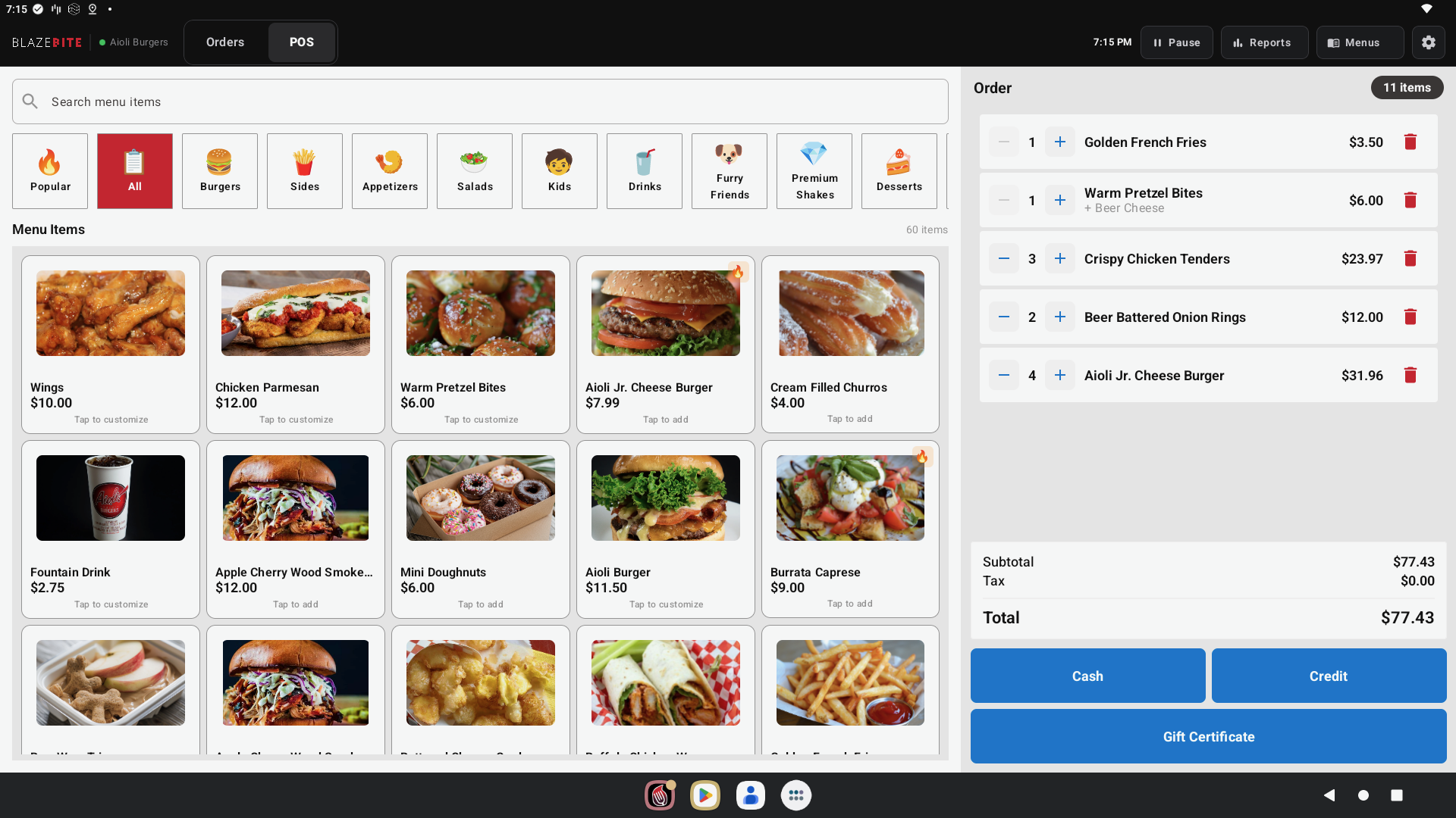 BlazeBite point-of-sale app showing the menu grid and live order panel